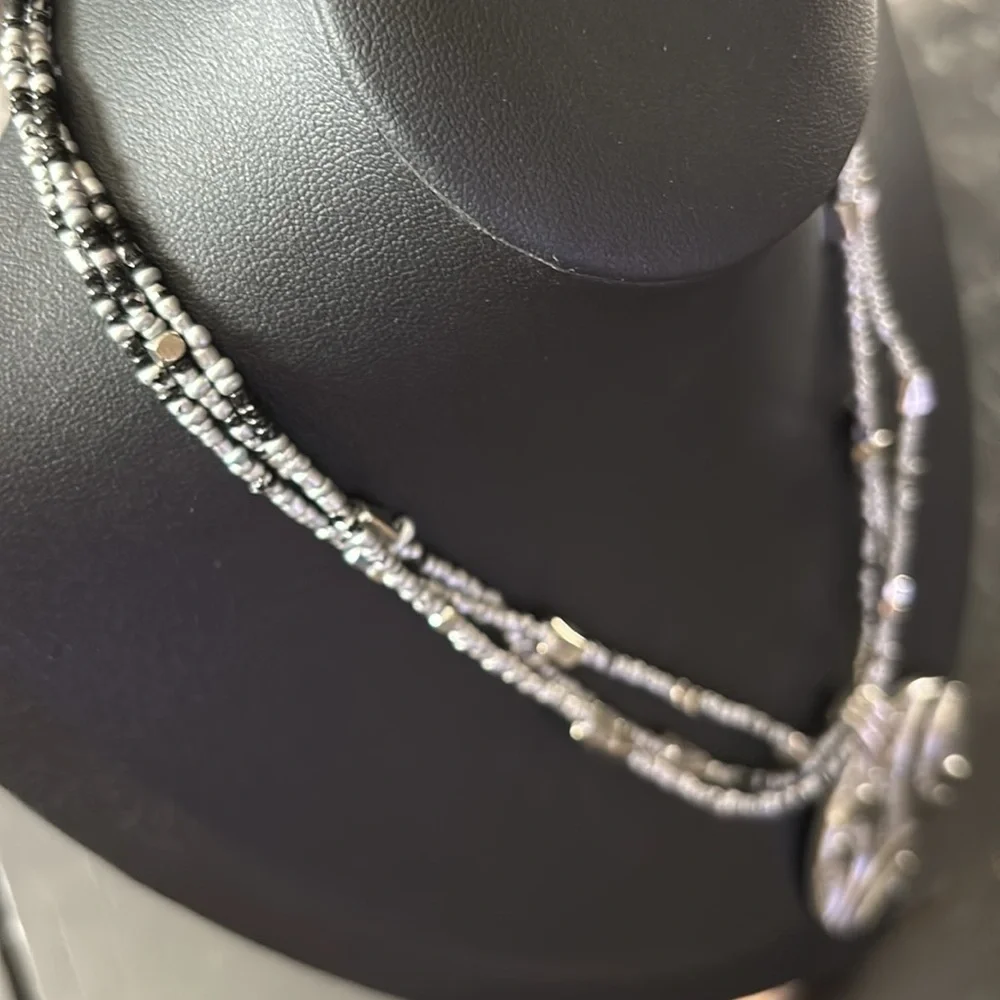 Lia Sophia Silver Tone Multistrand Beaded Circle Pendant